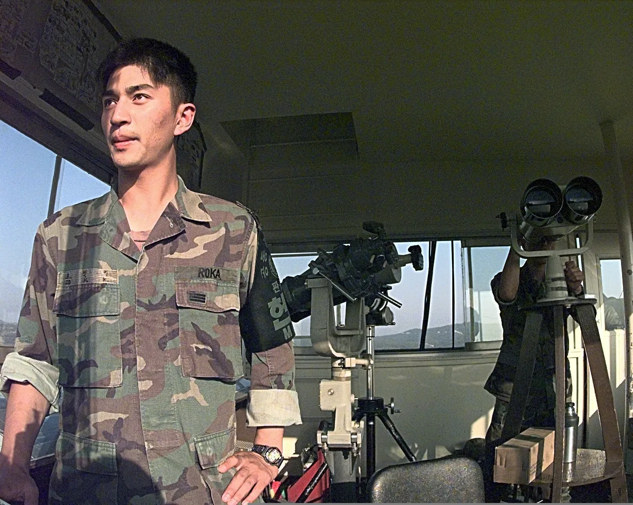 A South Korean soldier watches the North from a post in the Demilitarized Zone.