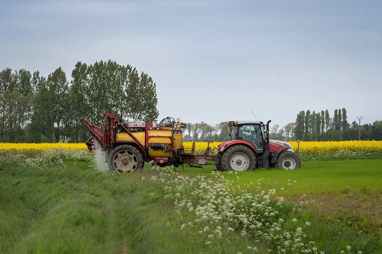 A tractor working a farm field